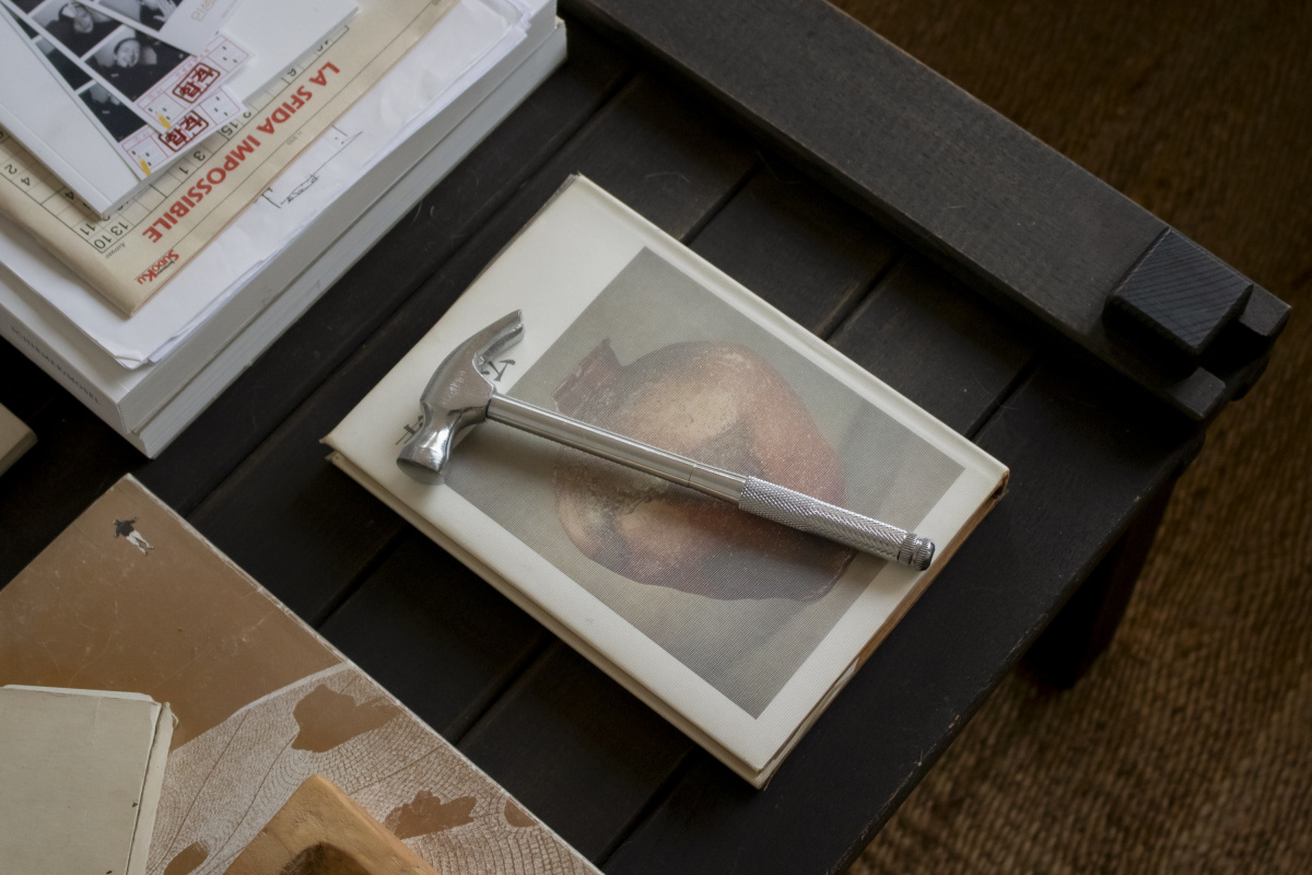 book and hammer on cofee table at charlotte taylors house