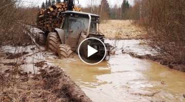 Valtra forestry tractor logging in wet conditions